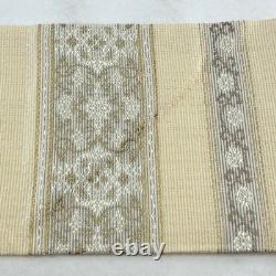 Beige silk semi-formal obi belt with Karakusa and Dan Shima golden thread style