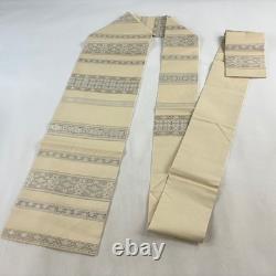 Beige silk semi-formal obi belt with Karakusa and Dan Shima golden thread style