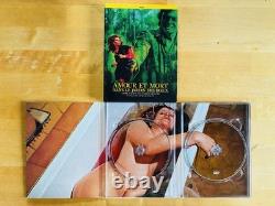 Blu-ray/DVD Box Set: Love and Death in the Garden of the Gods – Le Chat Qui Fume